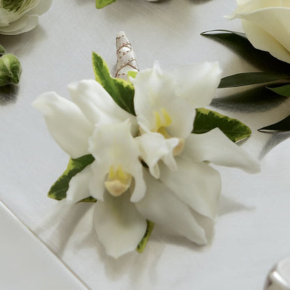 White Mini Cymbidium Boutonniere –  Distinctive Designs Floral Llc, Vilonia AR